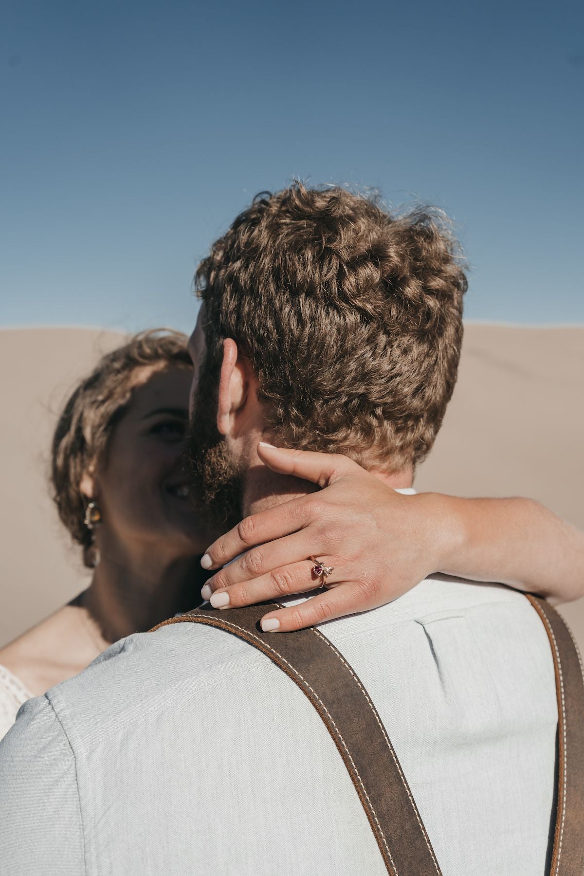 Kate Furman custom engagement ring. Couple getting married on beach!