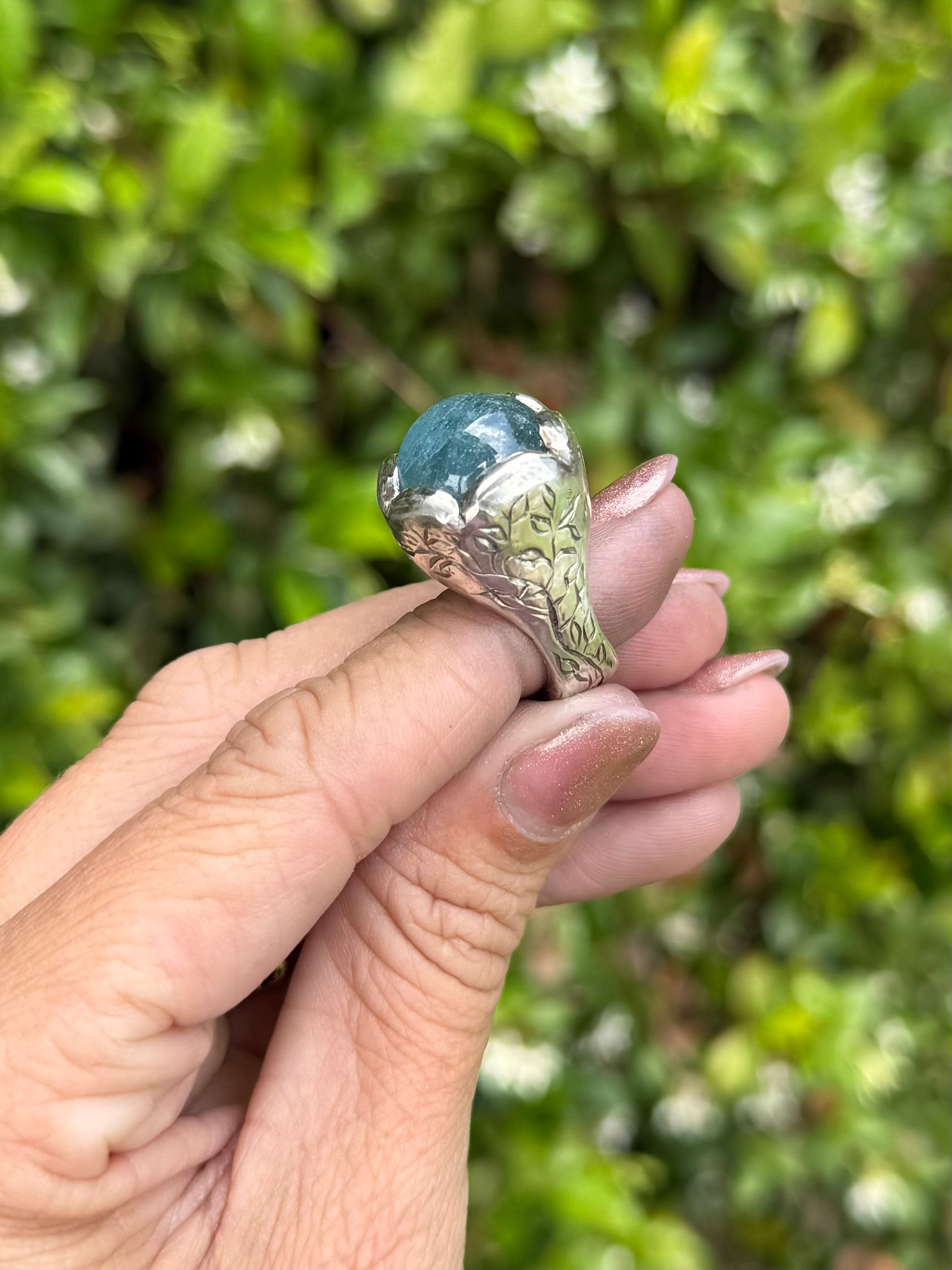 Aquamarine and silver engraved ring