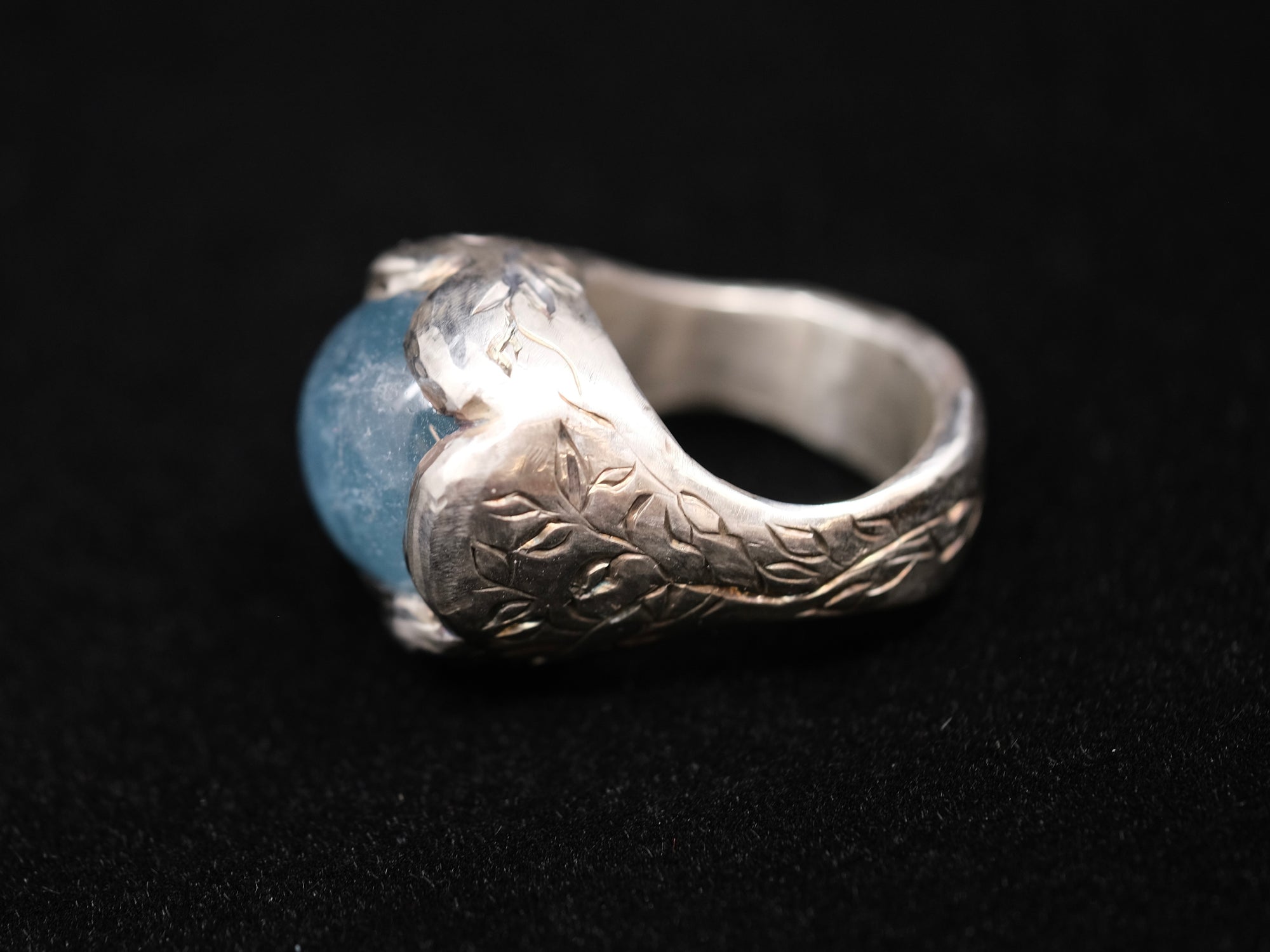 Aquamarine and silver engraved ring